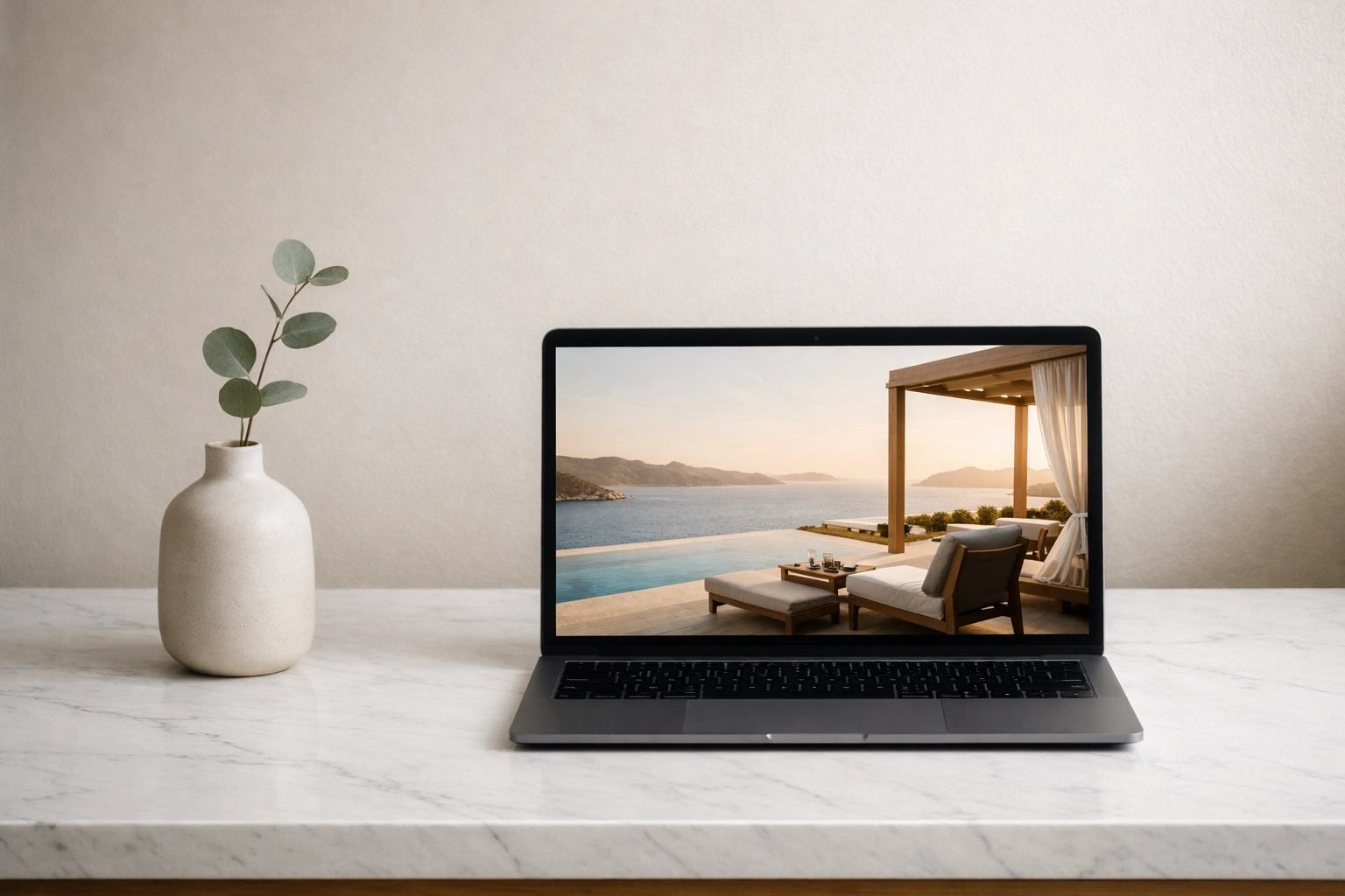 Hotel website on a laptop showing direct booking options and exclusive guest benefits.