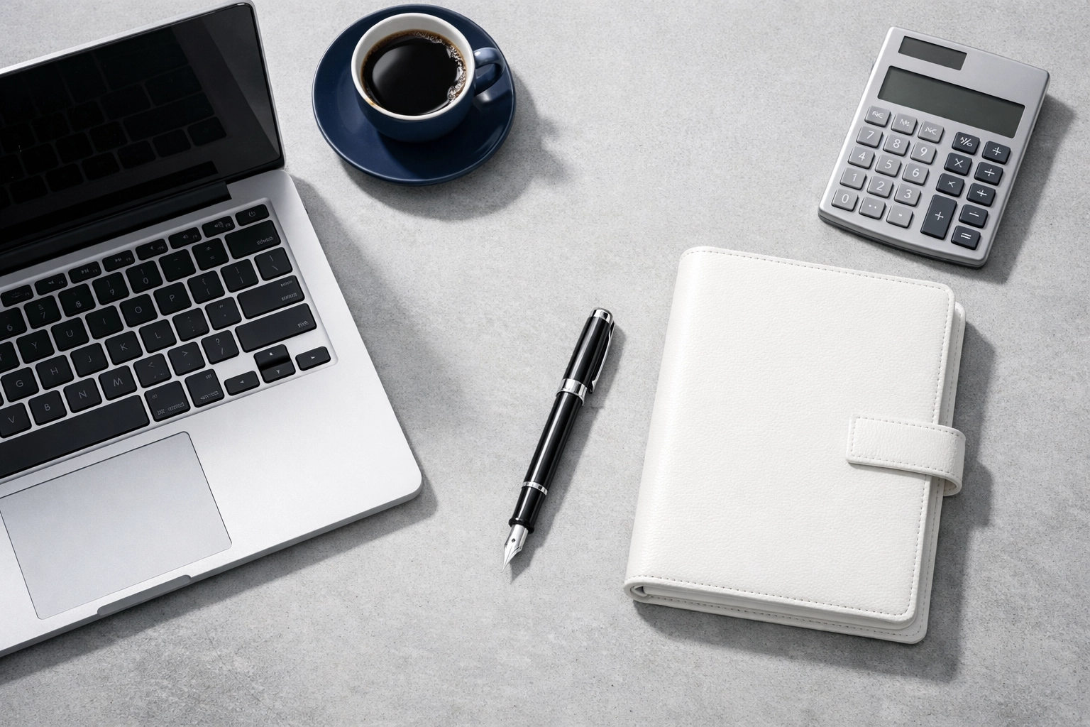 Modern workspace setup representing strategic payroll cost optimization and legal compliance.