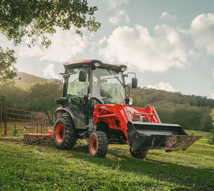 Kioti tractor with enclosed cab and front loader