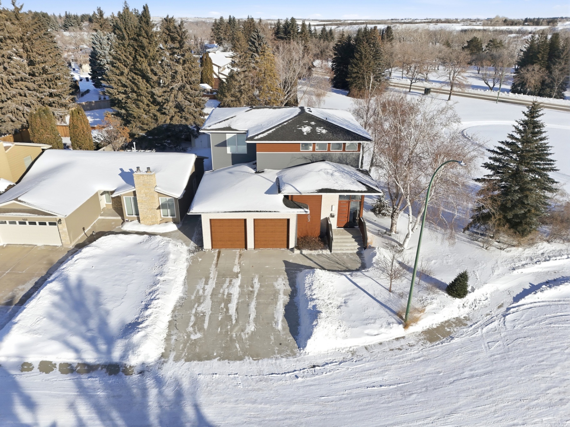 Aerial Winter Exterior Photo of Modern Home