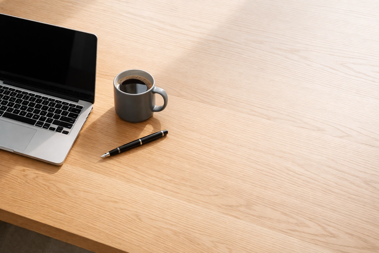 Minimalist workspace representing streamlined business processes for productive solo founders.