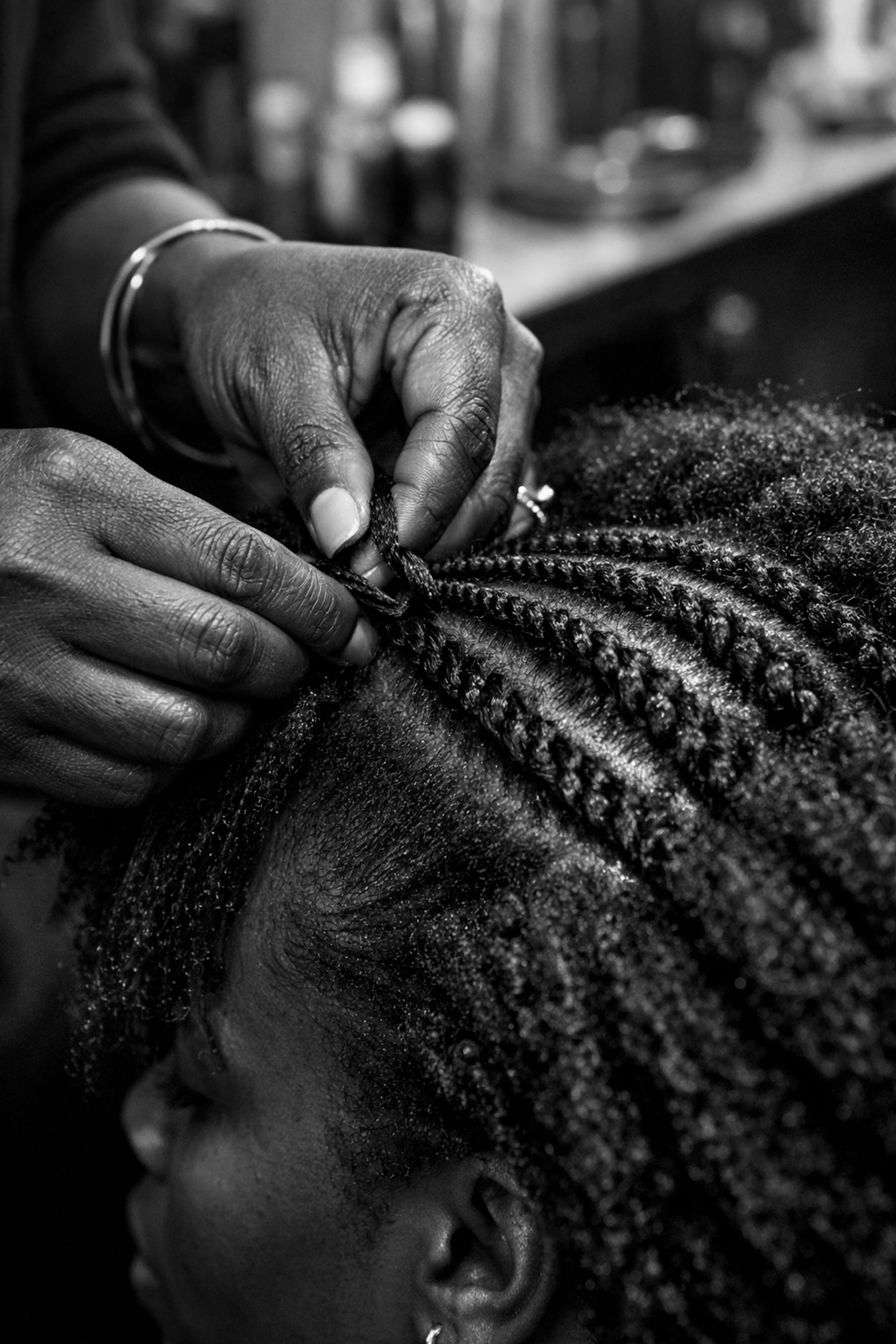 Professional texture training session for multicultural hair types at an Ohio barbering school.