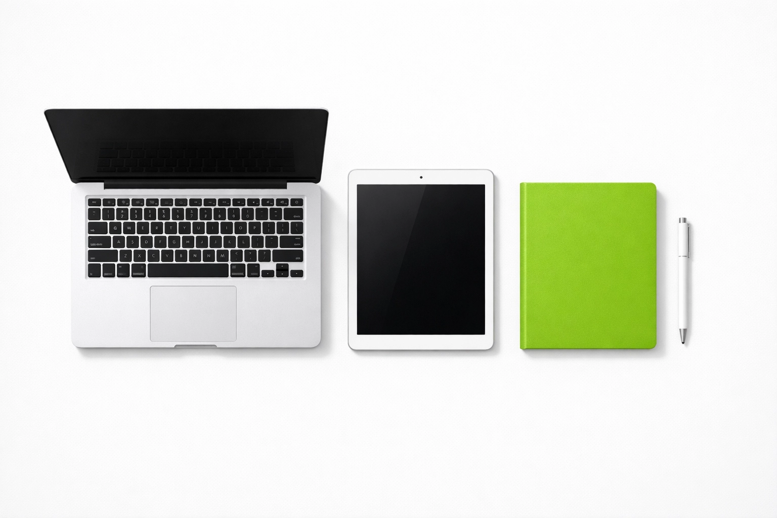 A minimalist desk with a laptop and tablet used for managing a professional website and local business SEO strategy.