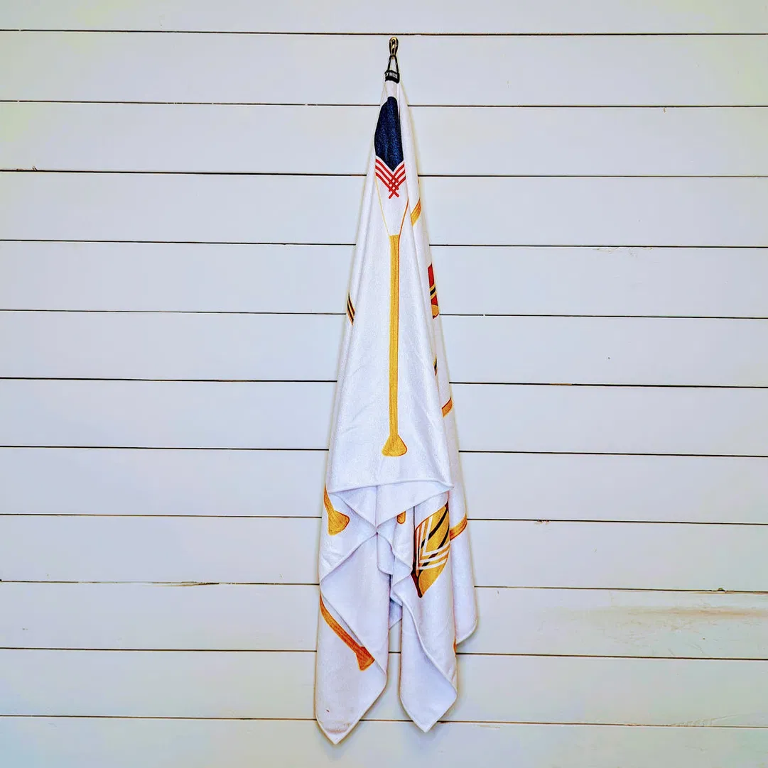 The Sandbanks Quick-Dry Towel featuring an iconic Canadian paddle print, perfect for rugged outdoor adventures.