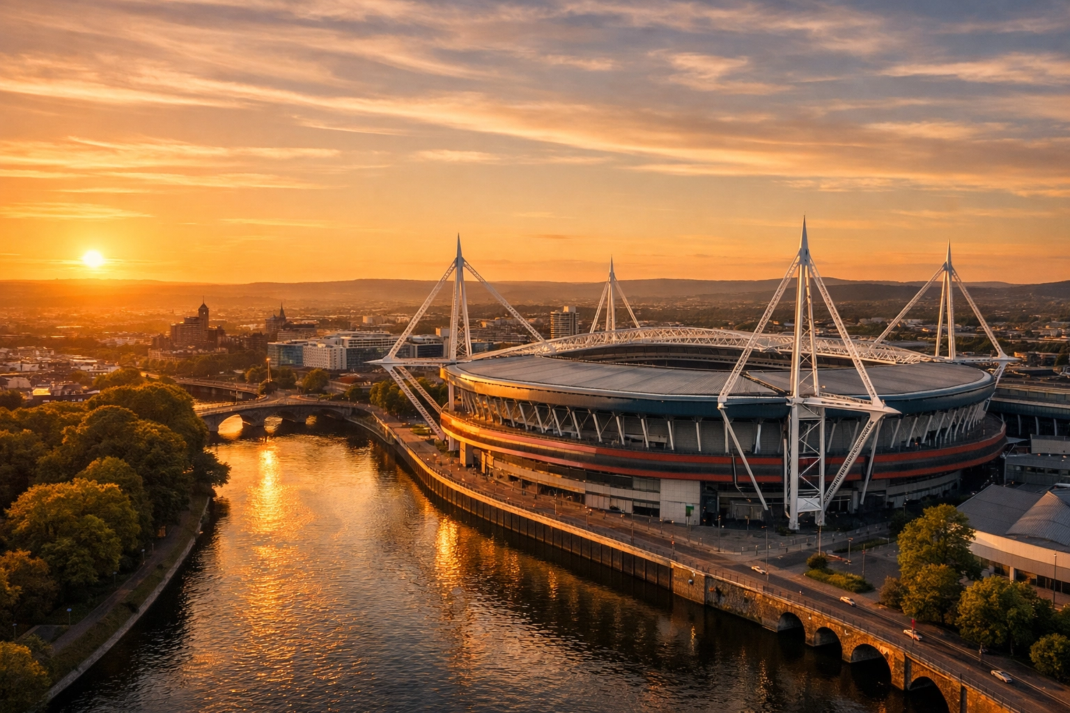 Sunset aerial view of Cardiff’s Principality Stadium and the River Taff, a meaningful site for Welsh rugby memorials.