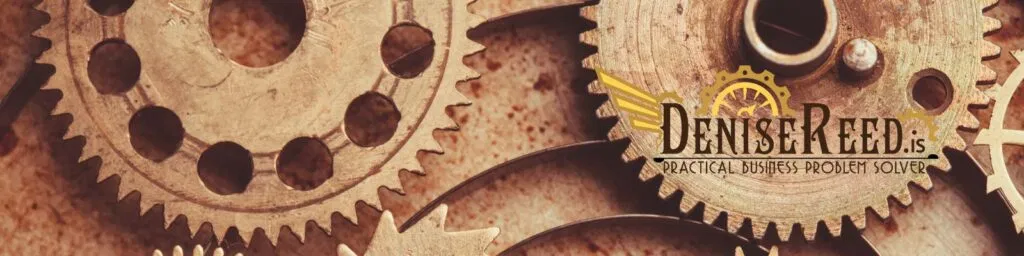 Interlocking brass gears symbolizing streamlined business operations