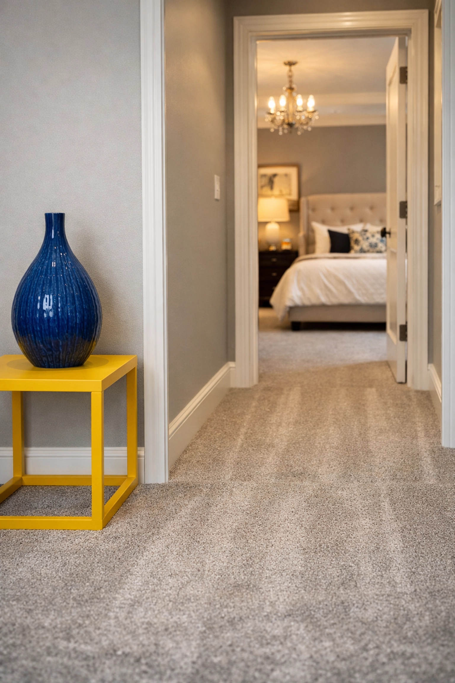Clean hallway with vacuumed carpet by maid services Lowell for a stress-free move-in.