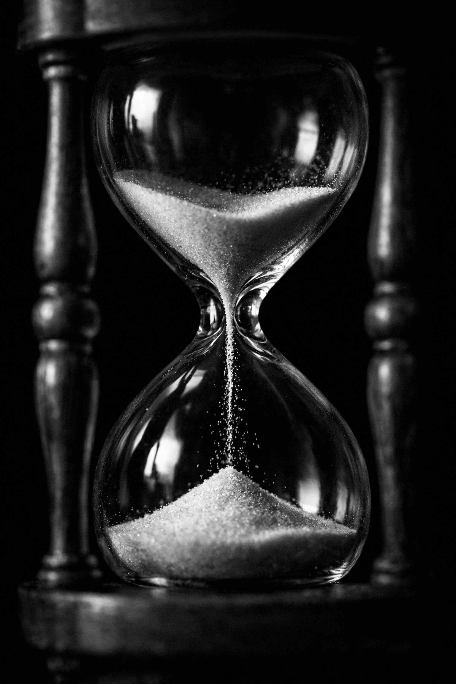 An hourglass symbolizing the 5-year Medicaid look-back period and urgency of long-term care planning in Maryland.