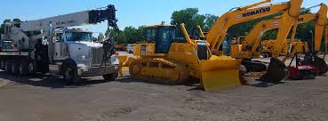 Heavy construction equipment in a lot