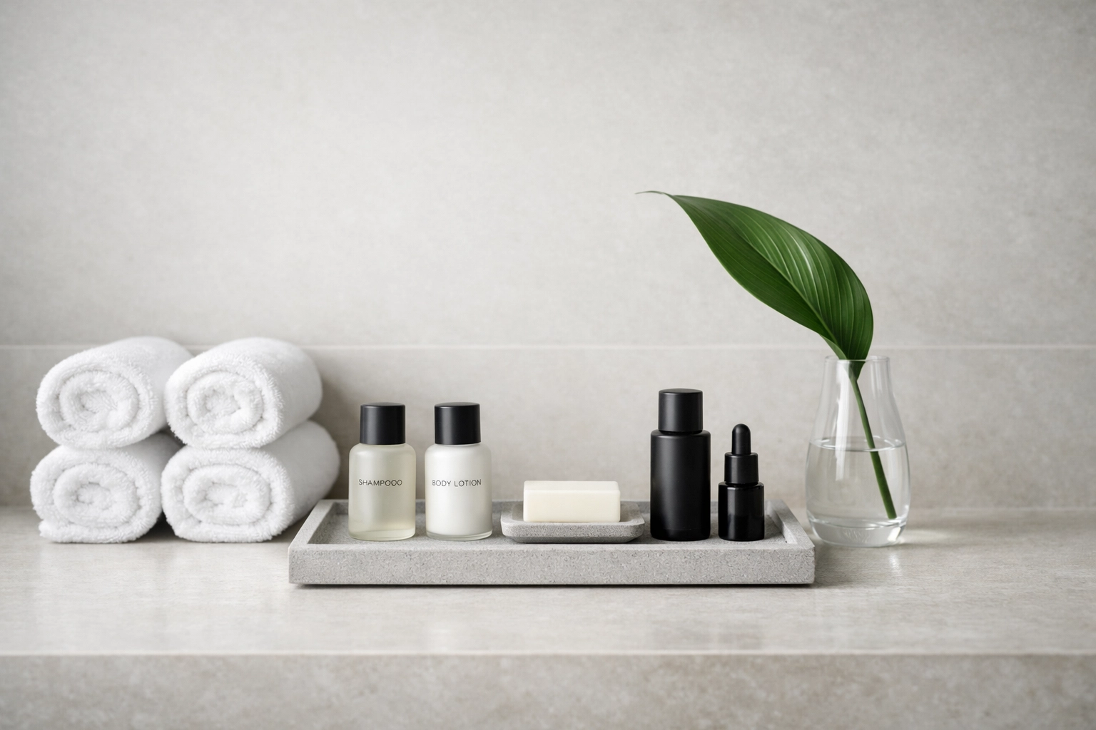 Pristine hotel bathroom vanity with rolled towels, illustrating automated quality standards.