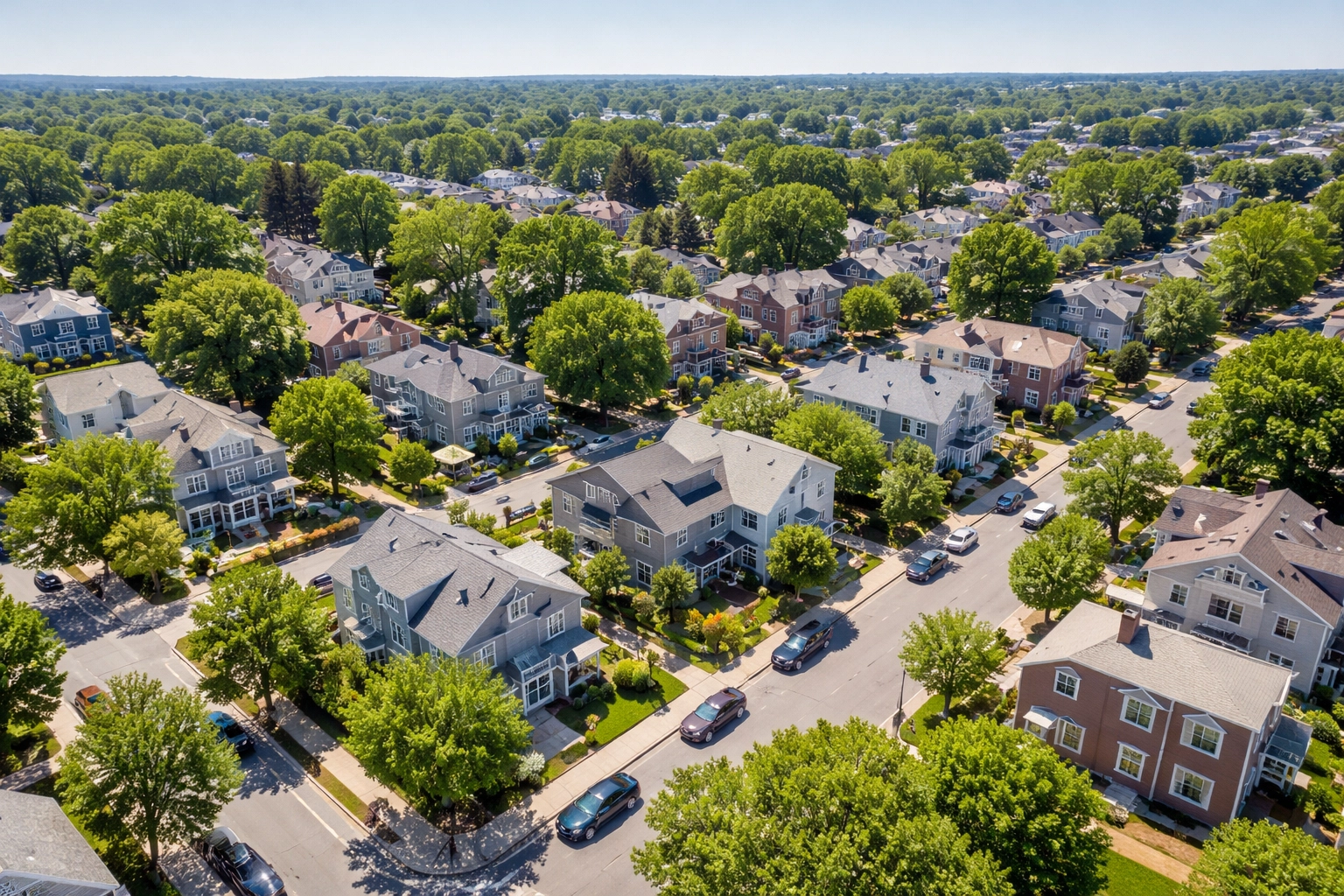 Photorealistic aerial drone view of a suburban neighborhood with diverse property types for local market research