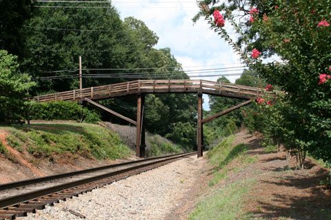 wooden-pedestrian-bridge-over-railroad-tracks-waxhaw.jpg