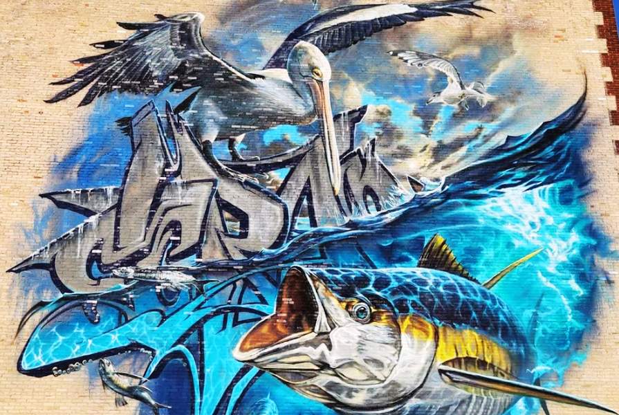 Public arts organization reviewing mural analytics data and impact reports