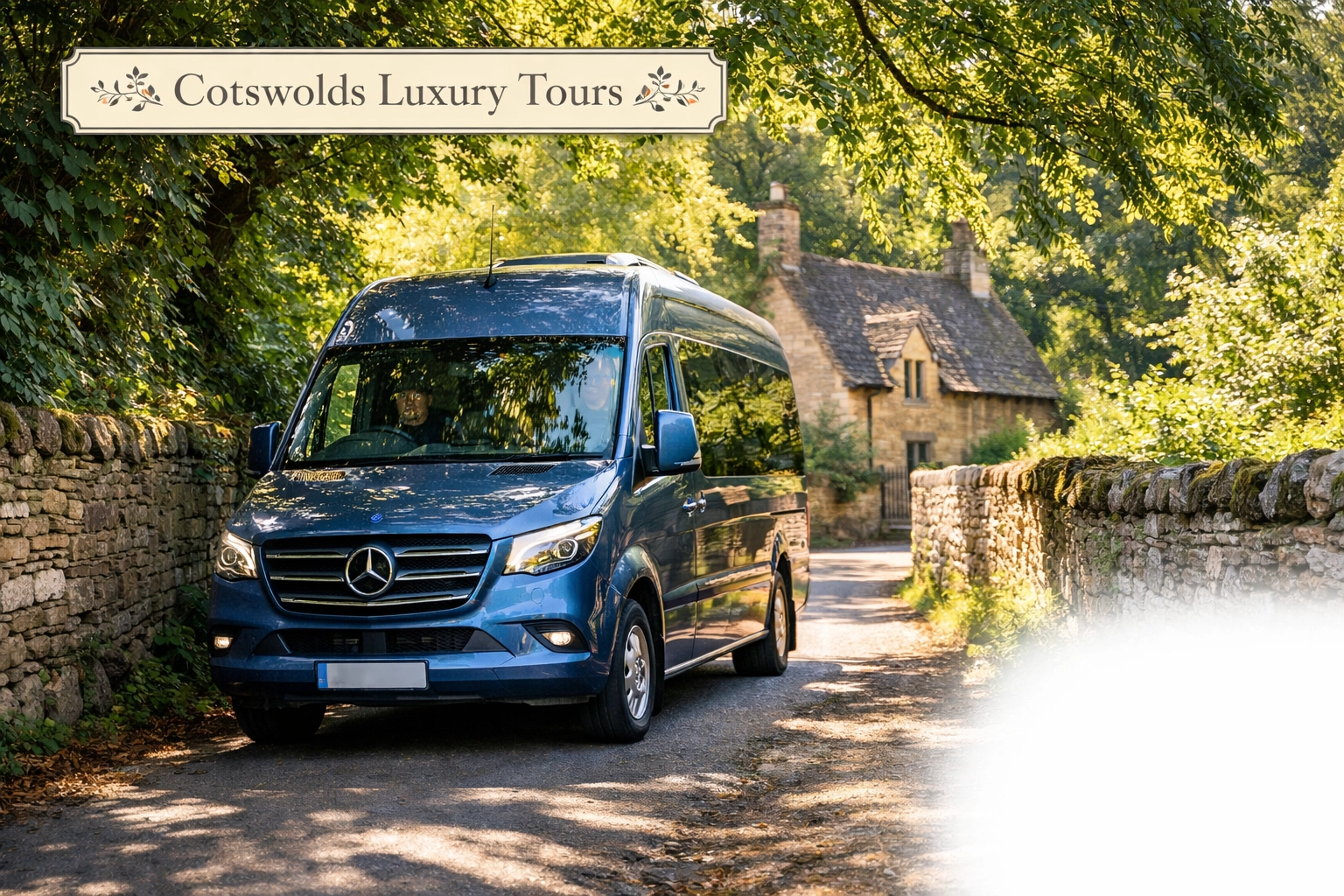 A Shakespeare Coaches Silver Blue Mercedes minibus navigating a quiet tree-lined lane in the Cotswolds.