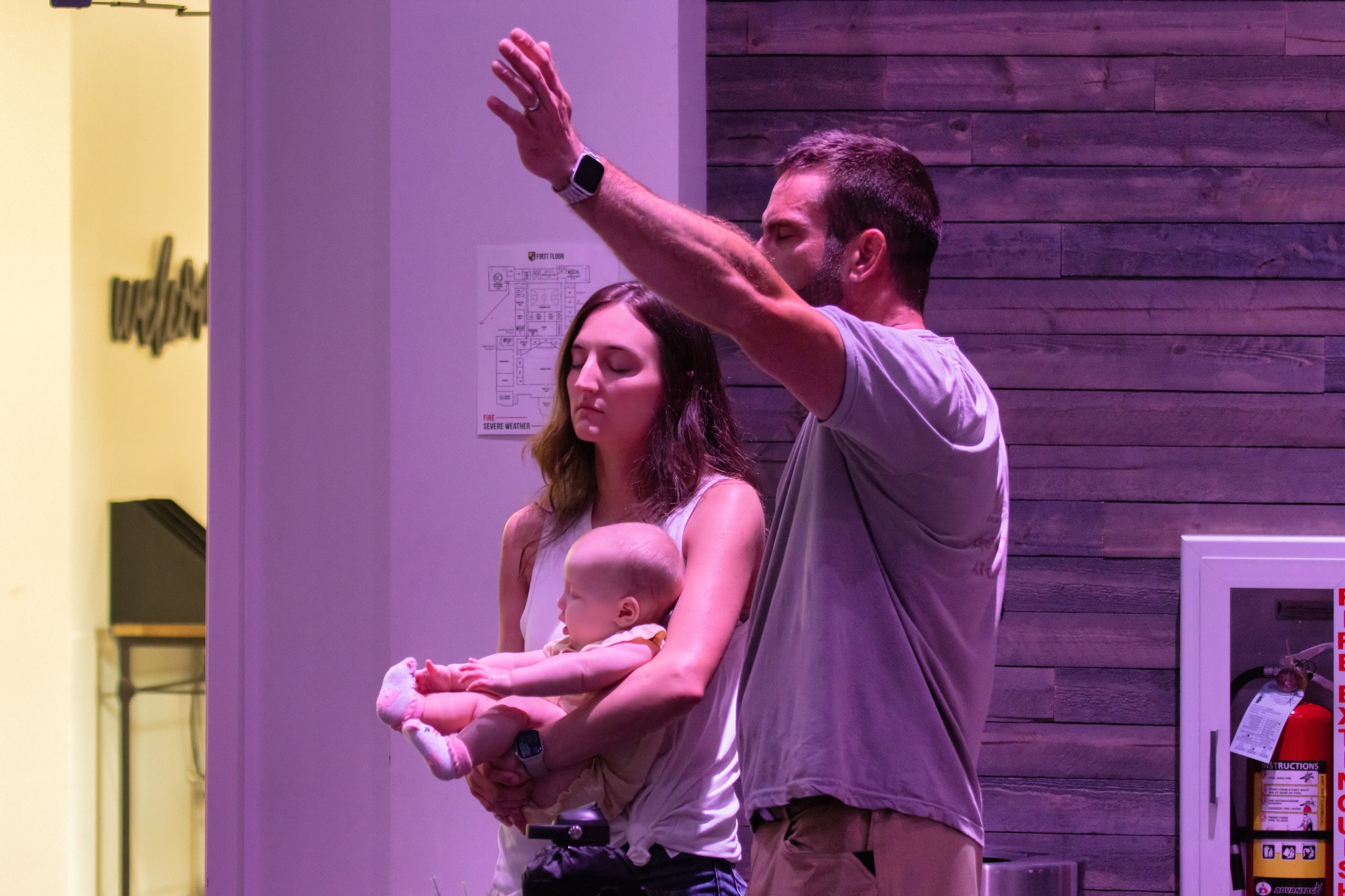 Young Family in Prayer at First Assembly Memphis