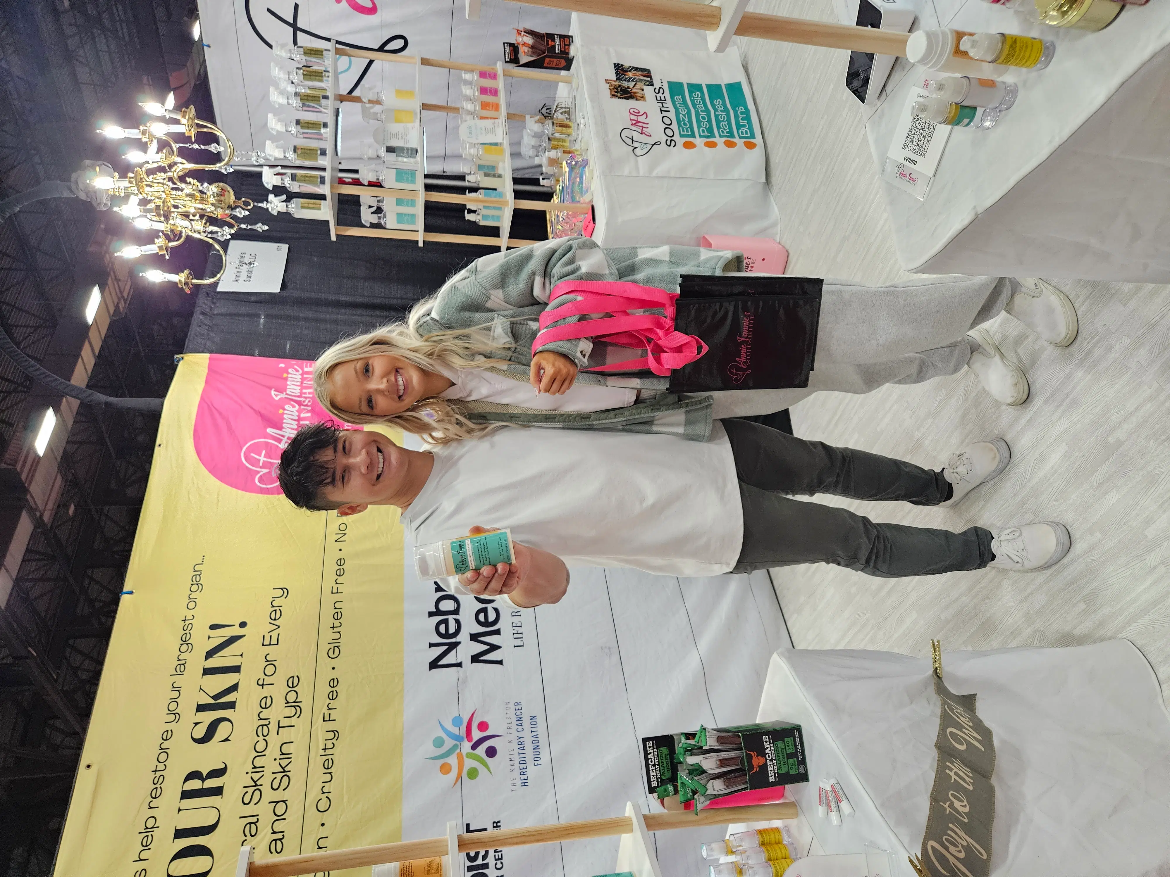 Happy customers at the Annie Fannie’s Sunshine booth (real community market moment)