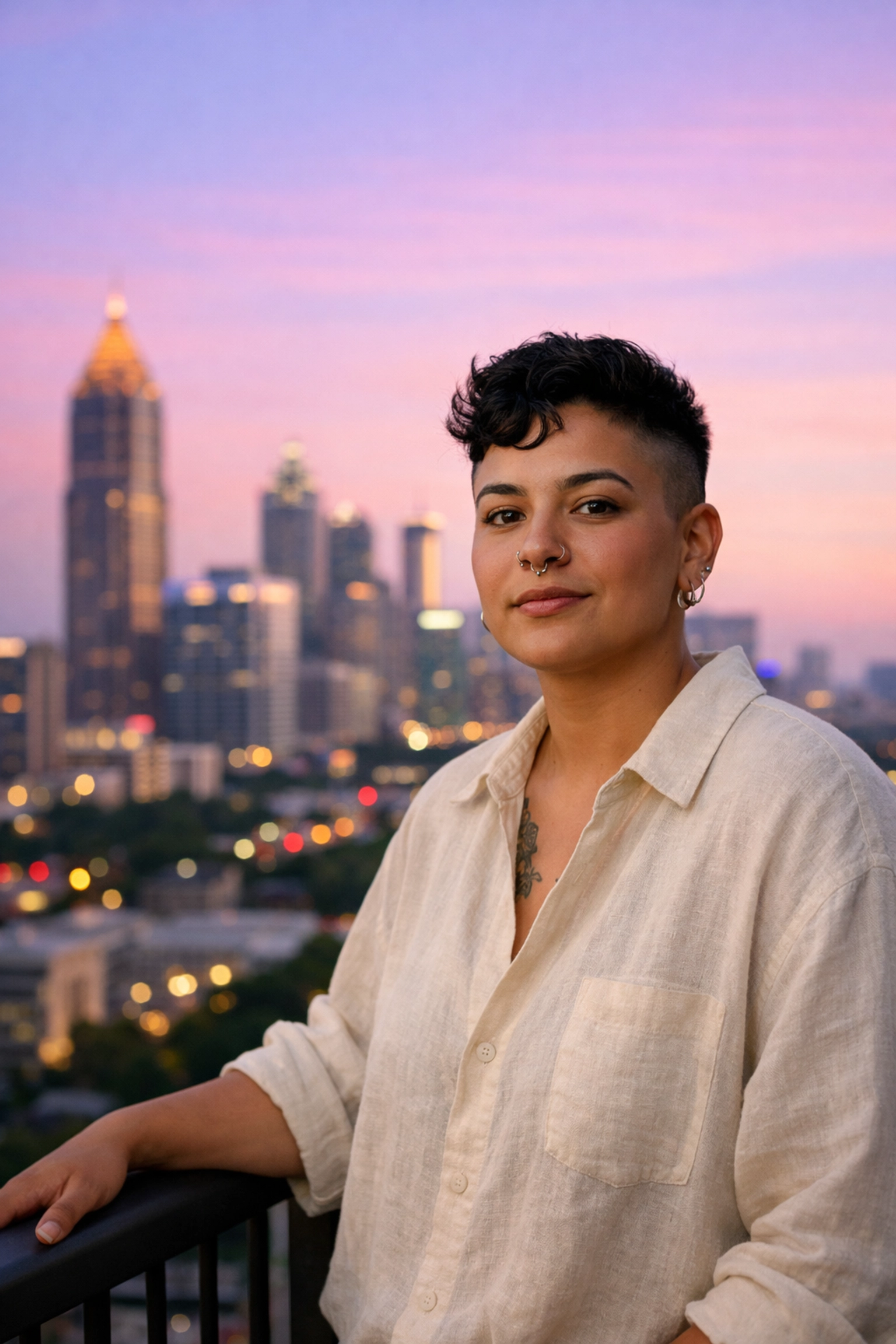 Resilient individual overlooking the Atlanta skyline, representing mental wellness in Georgia's LGBTQ+ community.