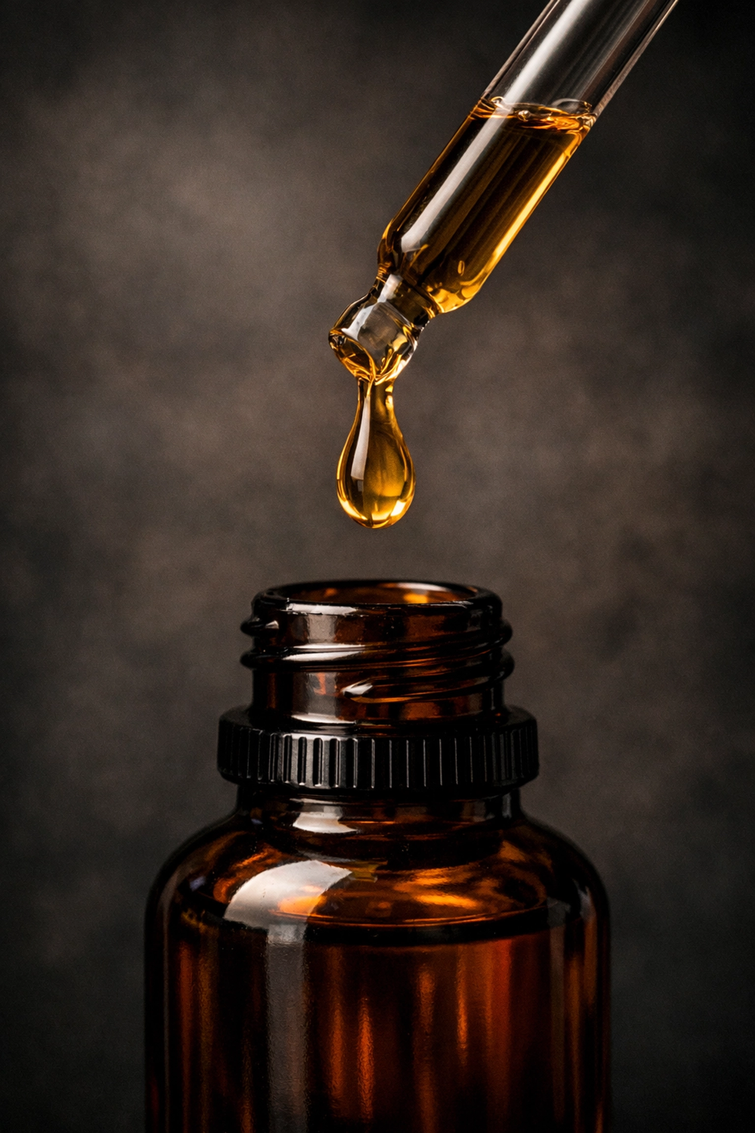 Premium beard oil drop showing the thick viscosity of a long-lasting parfum extrait fragrance.