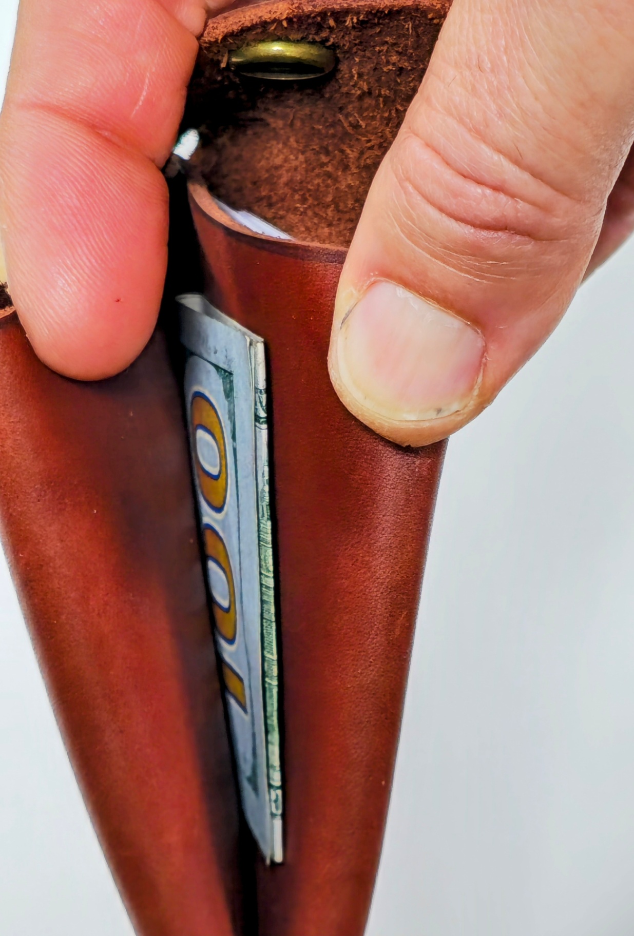 side view of burgundy wrinkle wallet