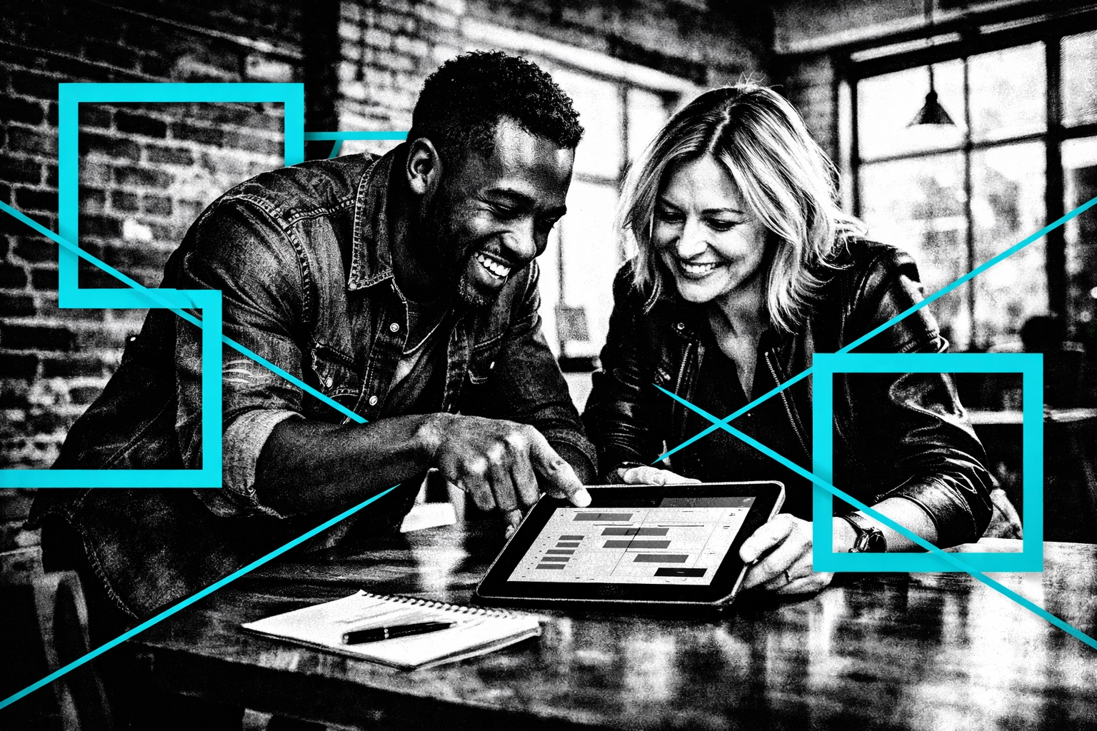 Business partners reviewing a digital marketing strategy to increase ROAS for their contracting company.