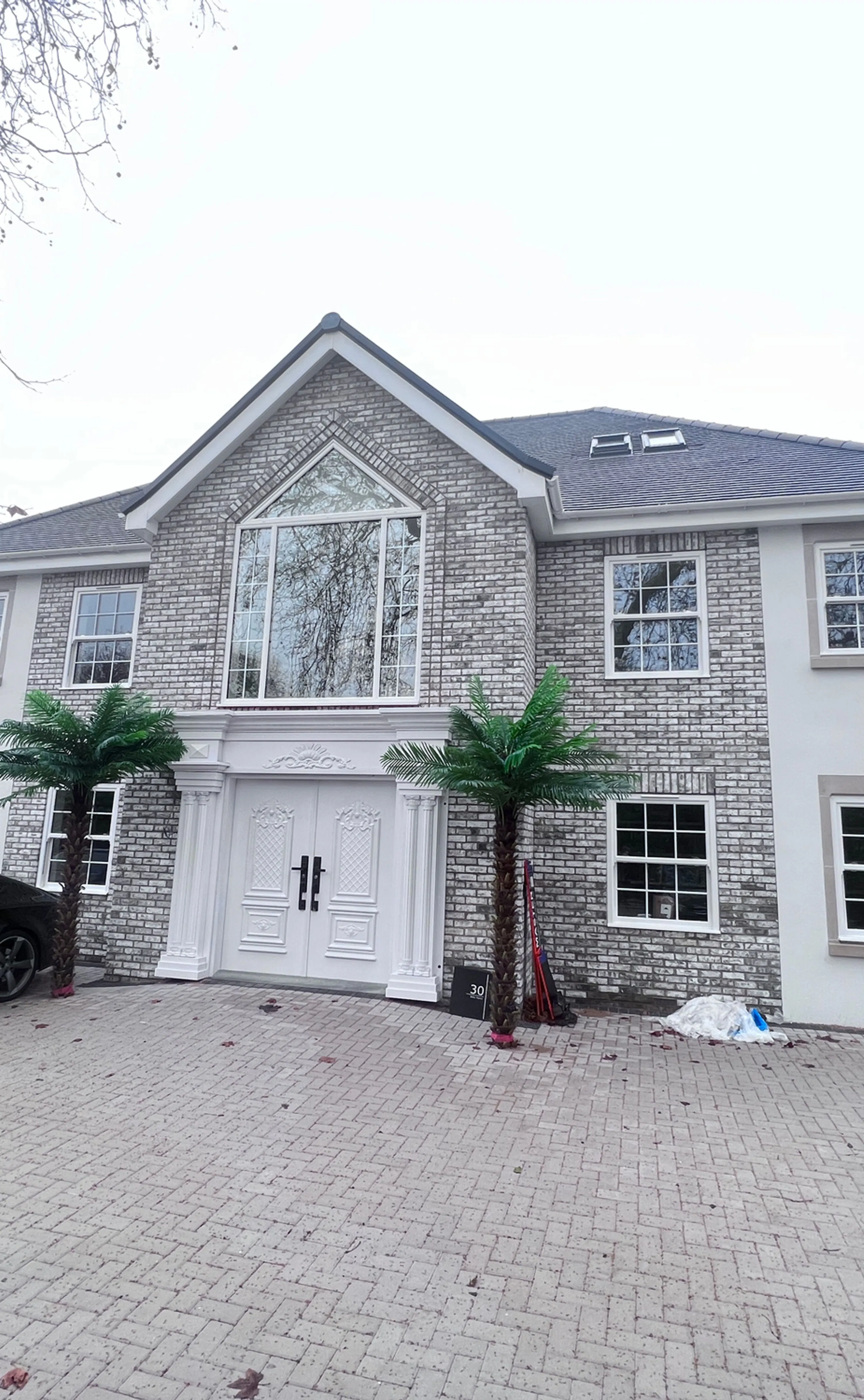 Modern residential property with grey brick façade