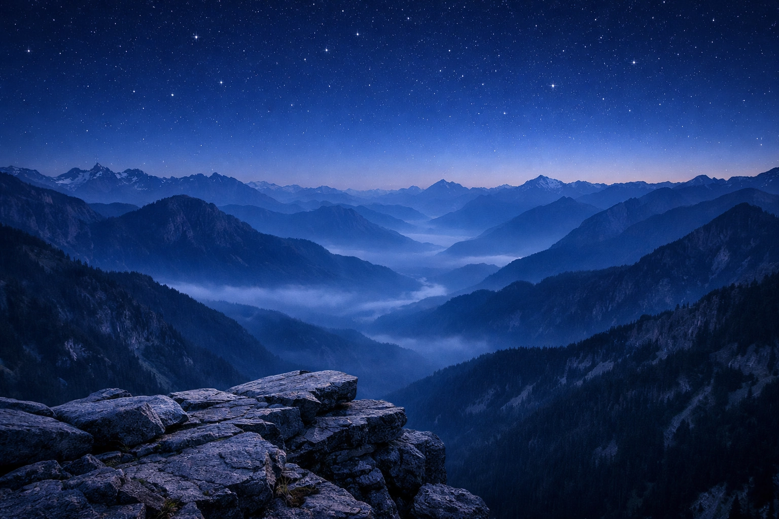 Panoramic blue hour landscape of misty mountains in a National Park, one of the best photography spots.