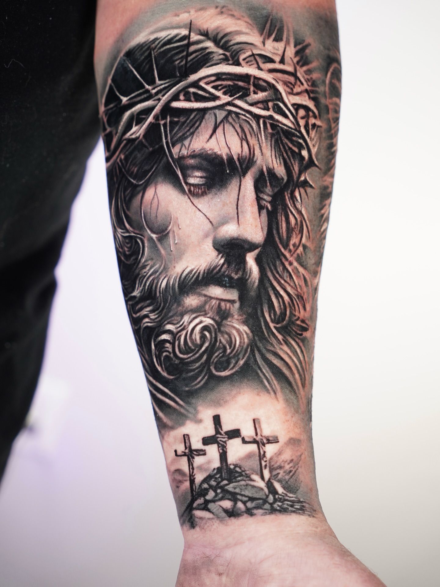 Hyper-realistic forearm tattoo