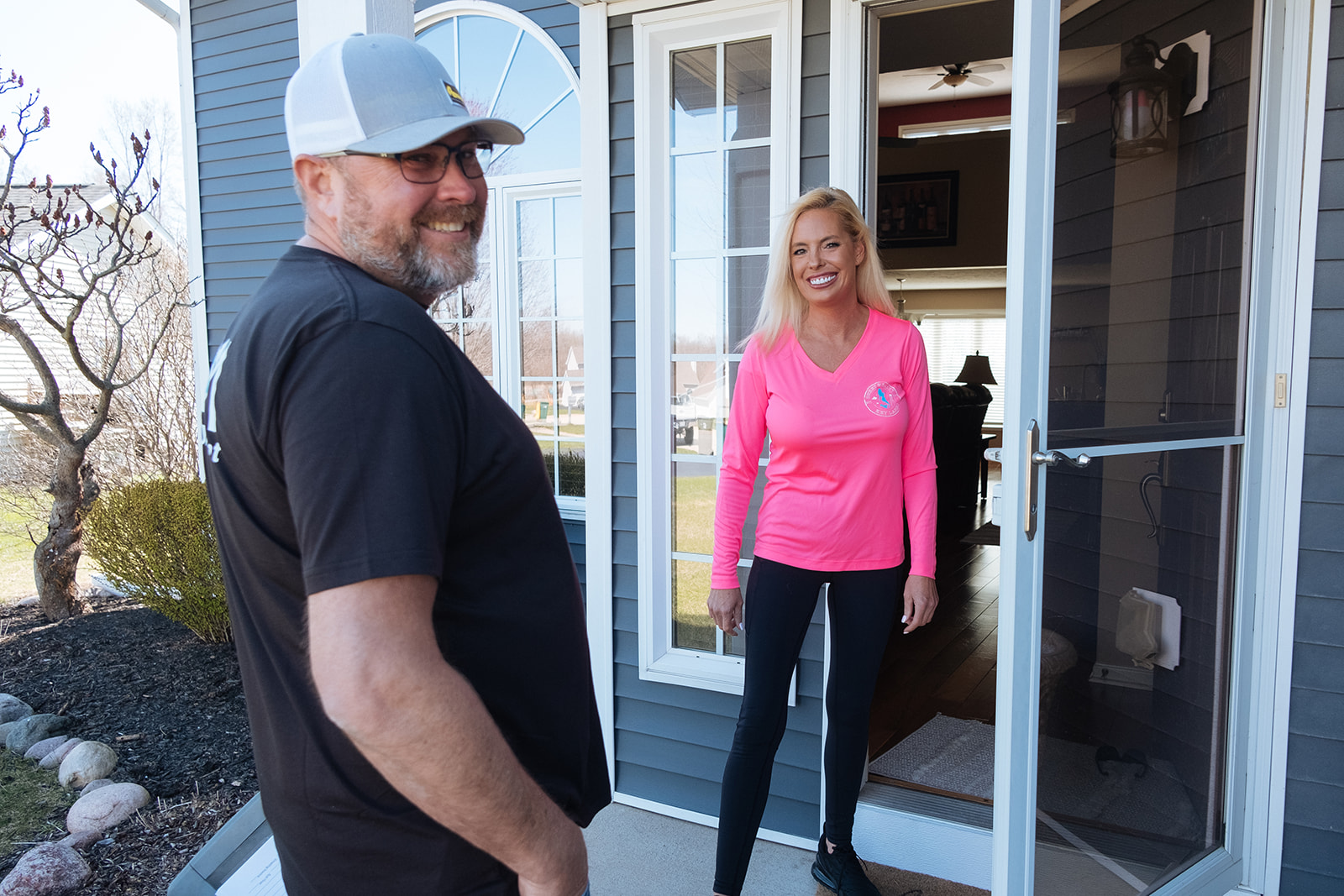 A technician from Air Quality Management, projecting professionalism and building trust with clients.