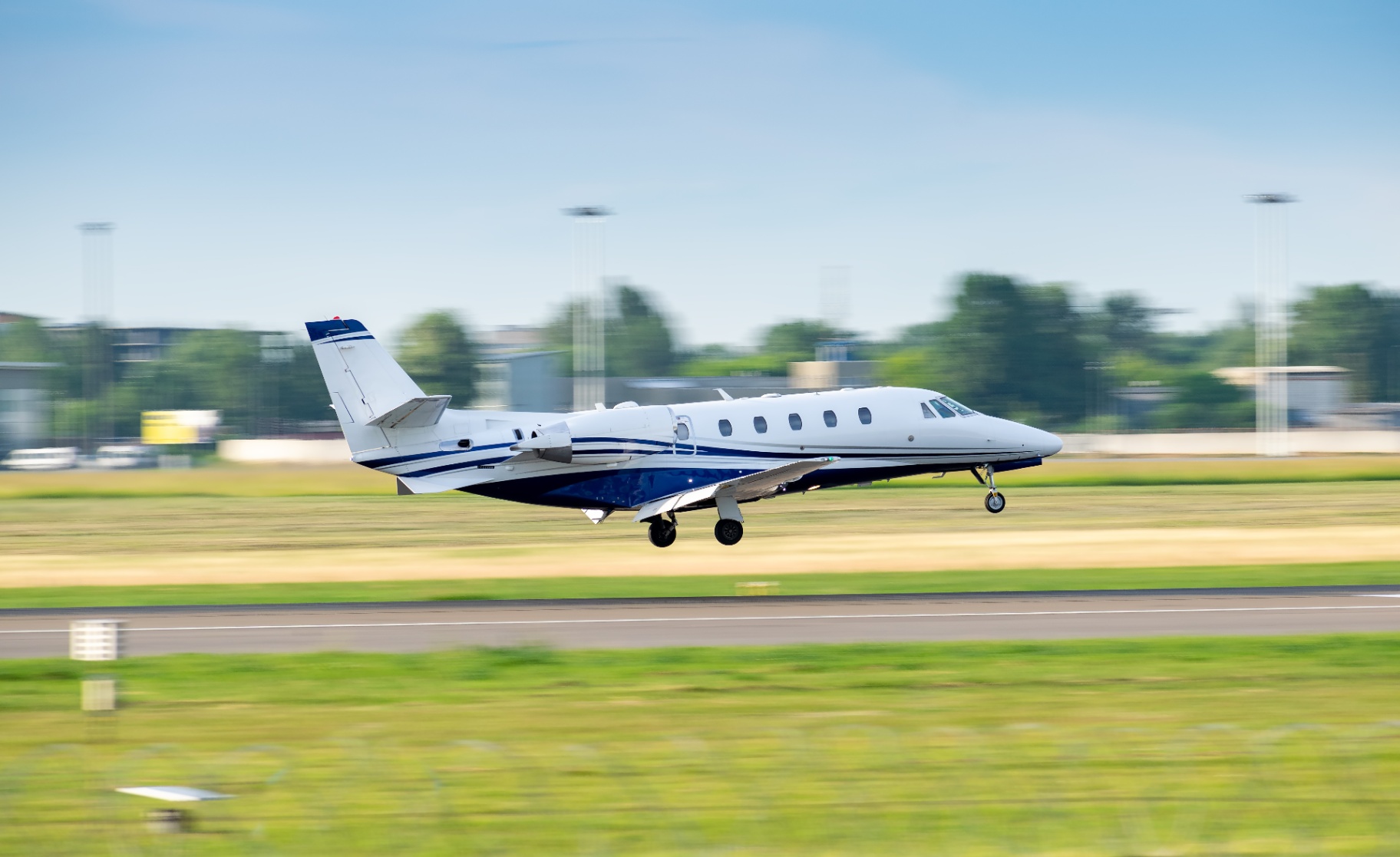 A midsize private jet taking off from the runway, reflecting the operational reliability you should expect from a vetted operator