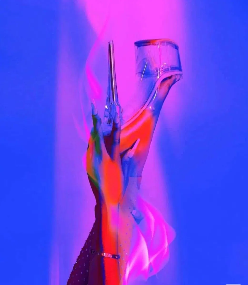 graceful hand with stiletto heel graceful hand with stiletto heel