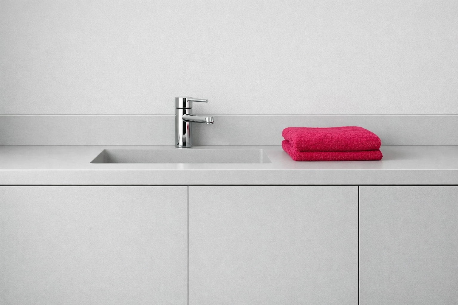 Modern vanity made from grey recycled plastic panels, ideal for moisture-prone commercial fit-outs.