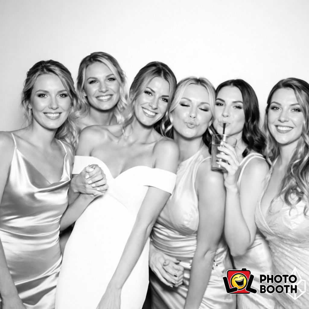 Elegant B&W glam group shot — the quintessential “Gala Glow” with that crisp, editorial finish.