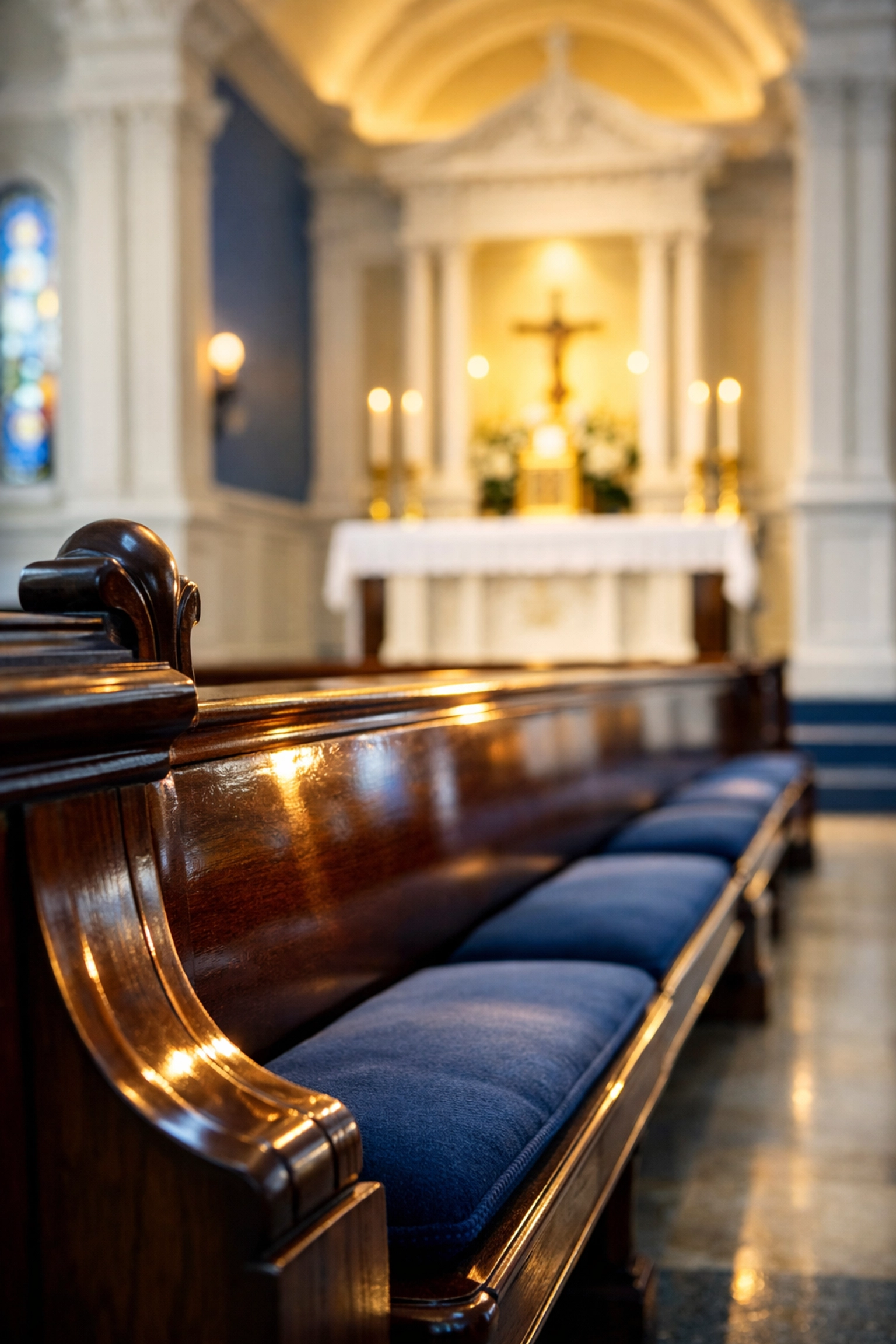 Polished wooden pews in a clean church sanctuary maintained by professional church cleaning services.