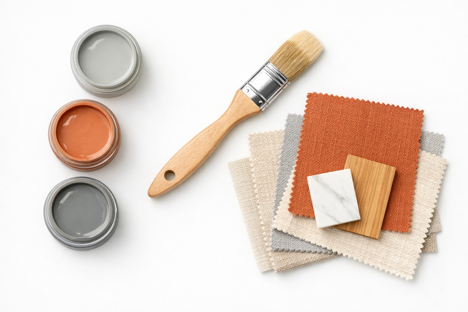 Home renovation planning materials including paint samples for a Gloucestershire decorating project.