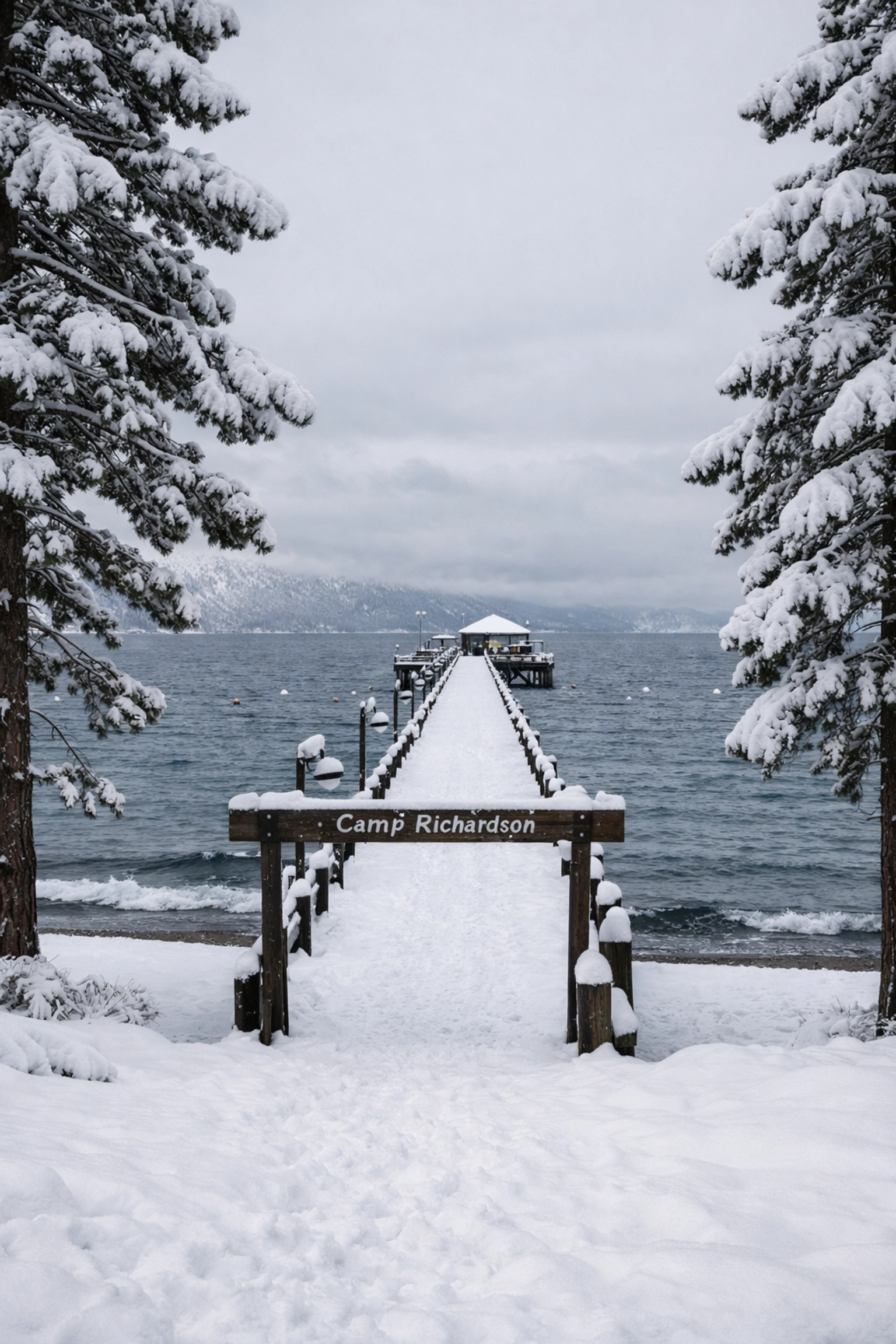 Snow-covered pier at Camp Richardson in South Lake Tahoe, ideal for winter landscape photography.