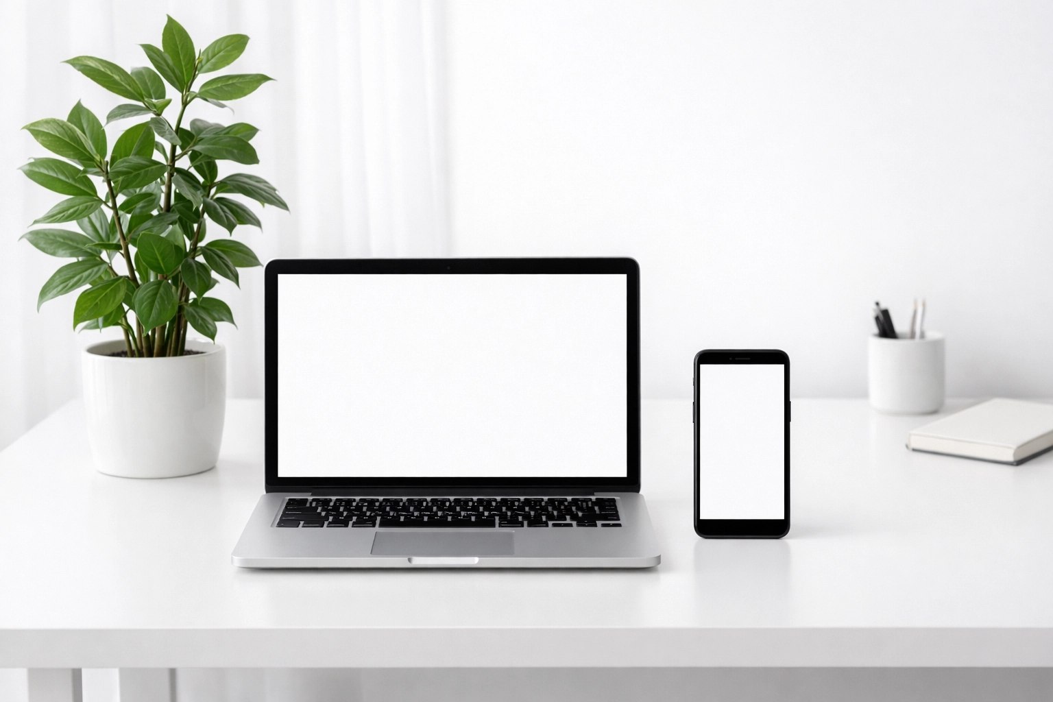 A professional workspace showing a managed business website on both a laptop and smartphone.