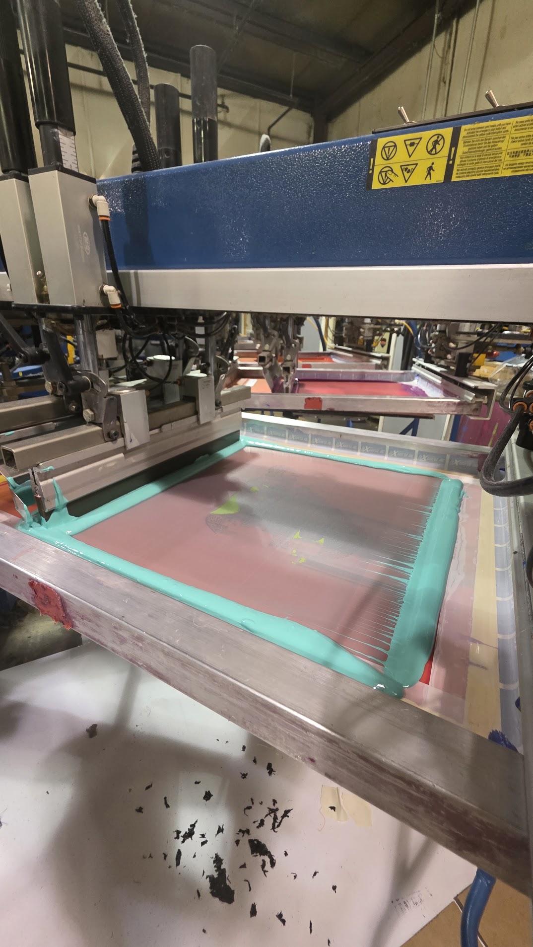 Automated screen printing press