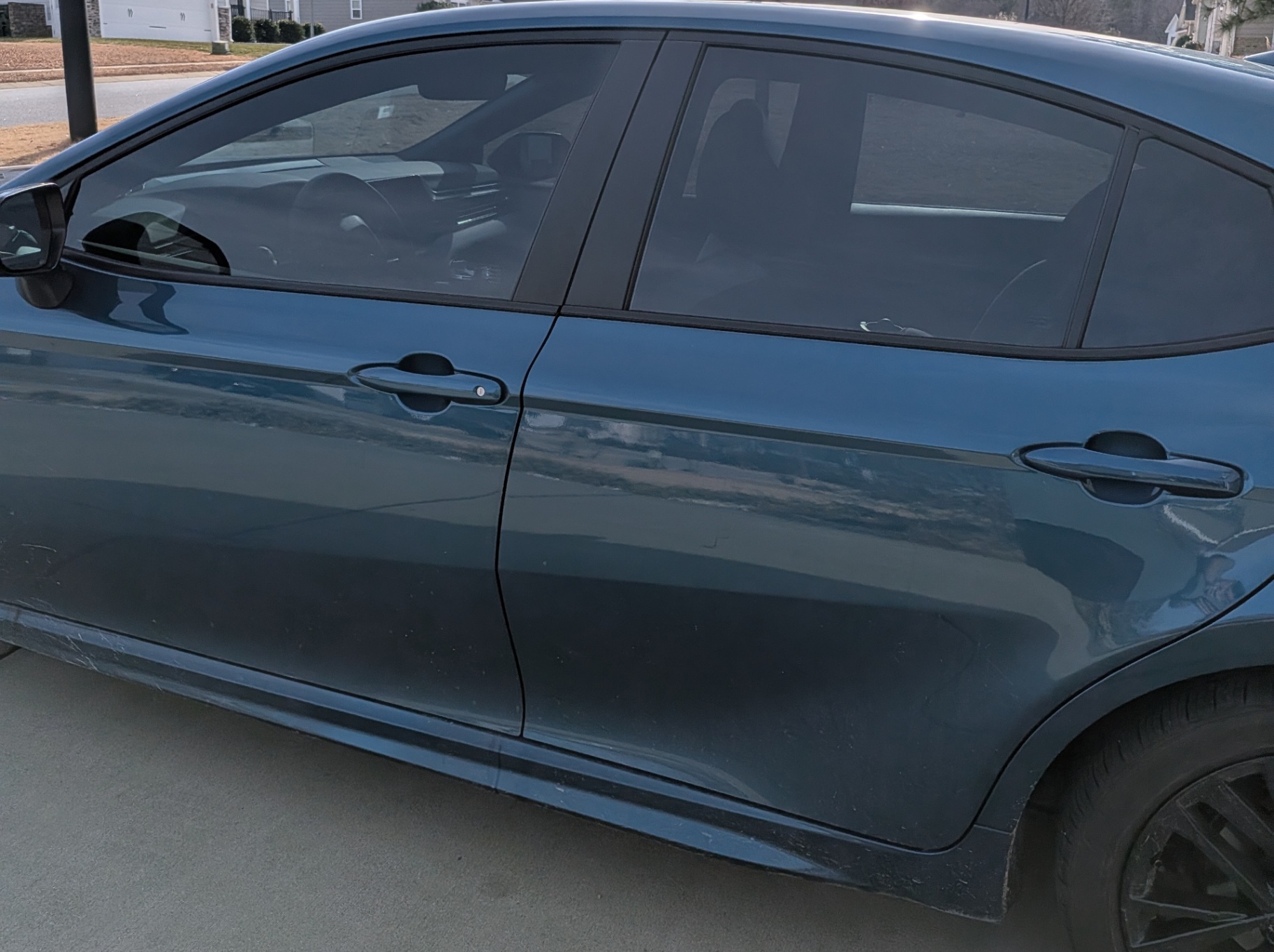 Dark Blue Sedan with Tinted Windows