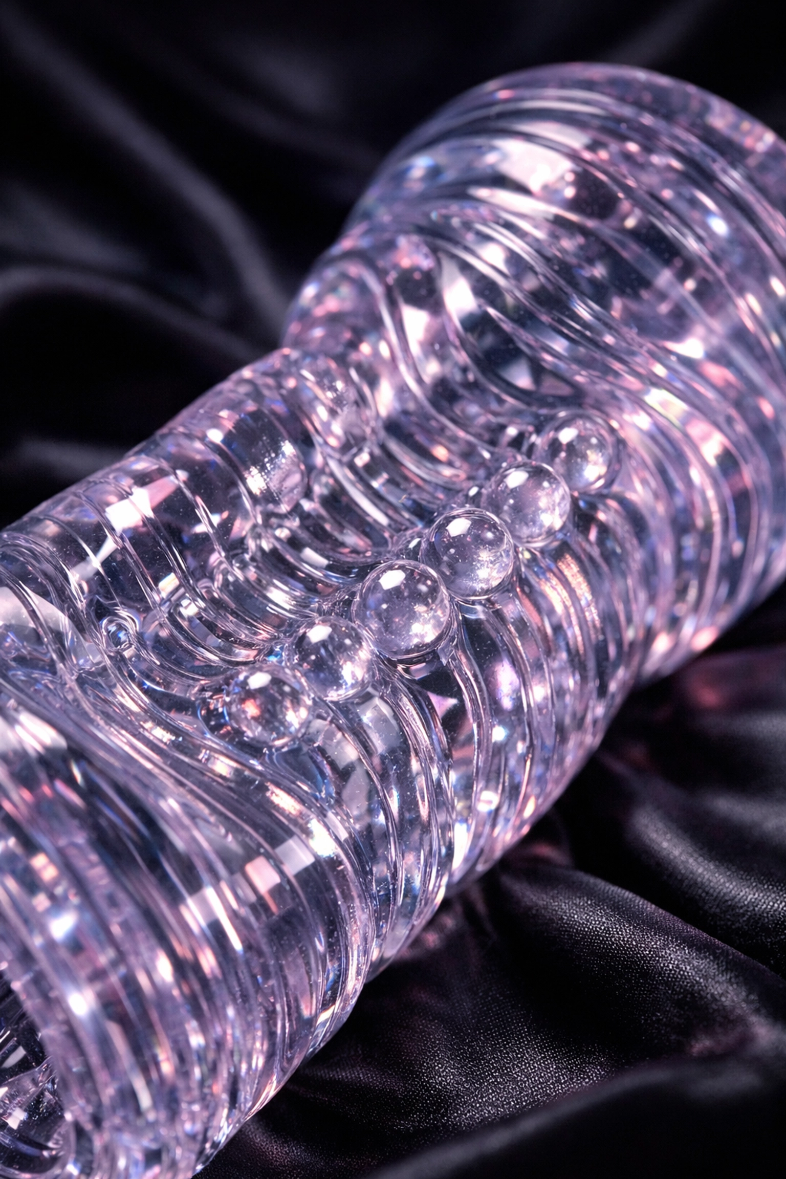 Premium clear crystal condom sleeve with textured surface for intimate first night gifting.