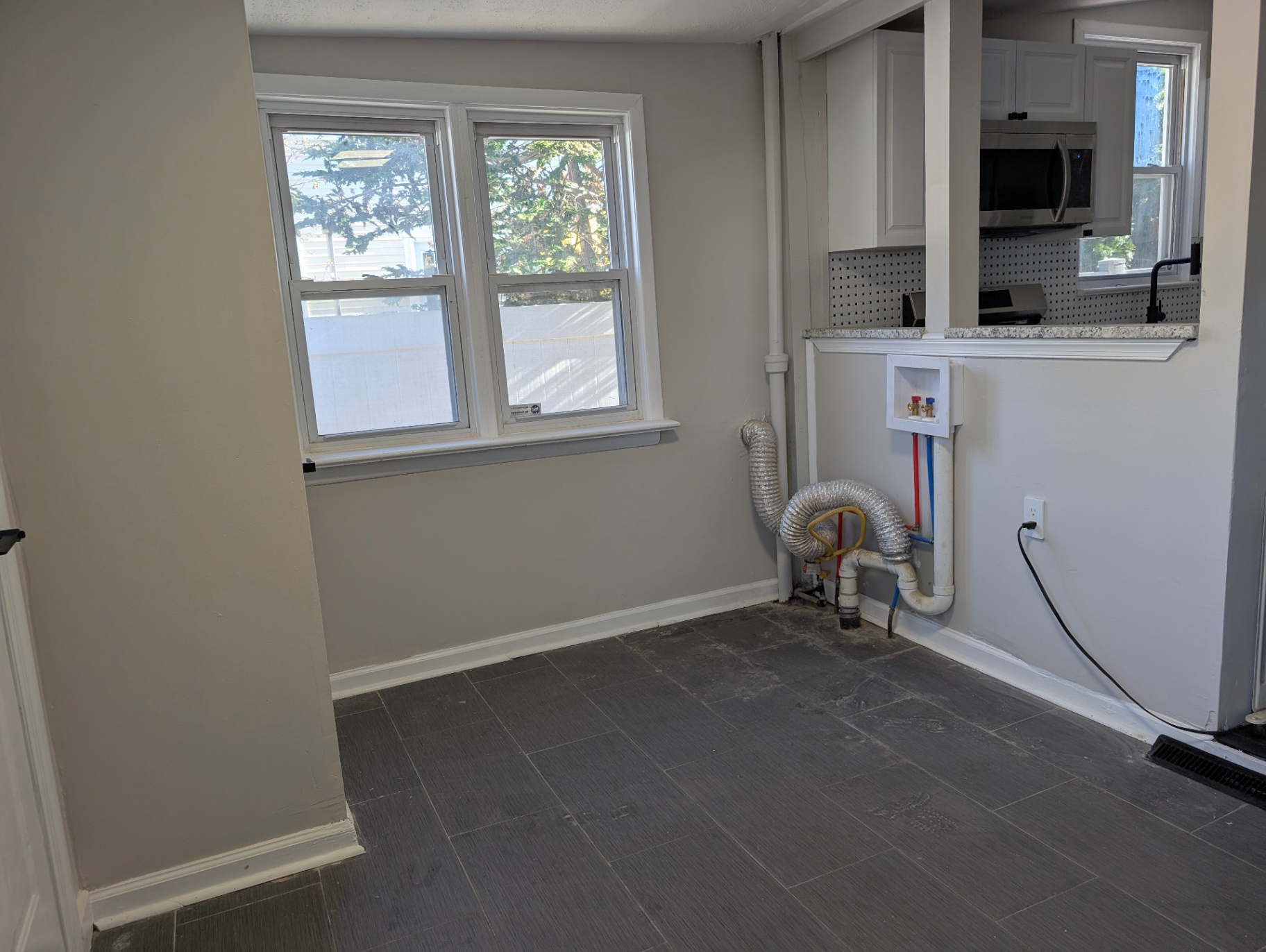Laundry Area and Kitchen View