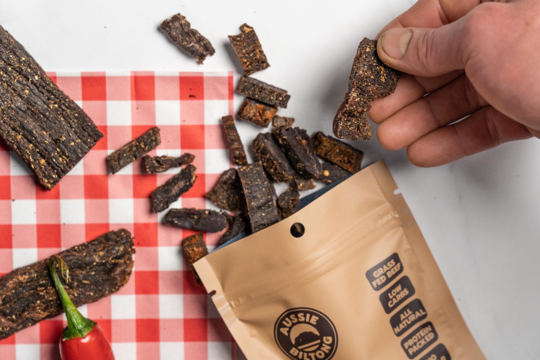 Aussie Biltong snack display, healthy meat snacks, high protein snacks, benefits of biltong, premium Australian beef