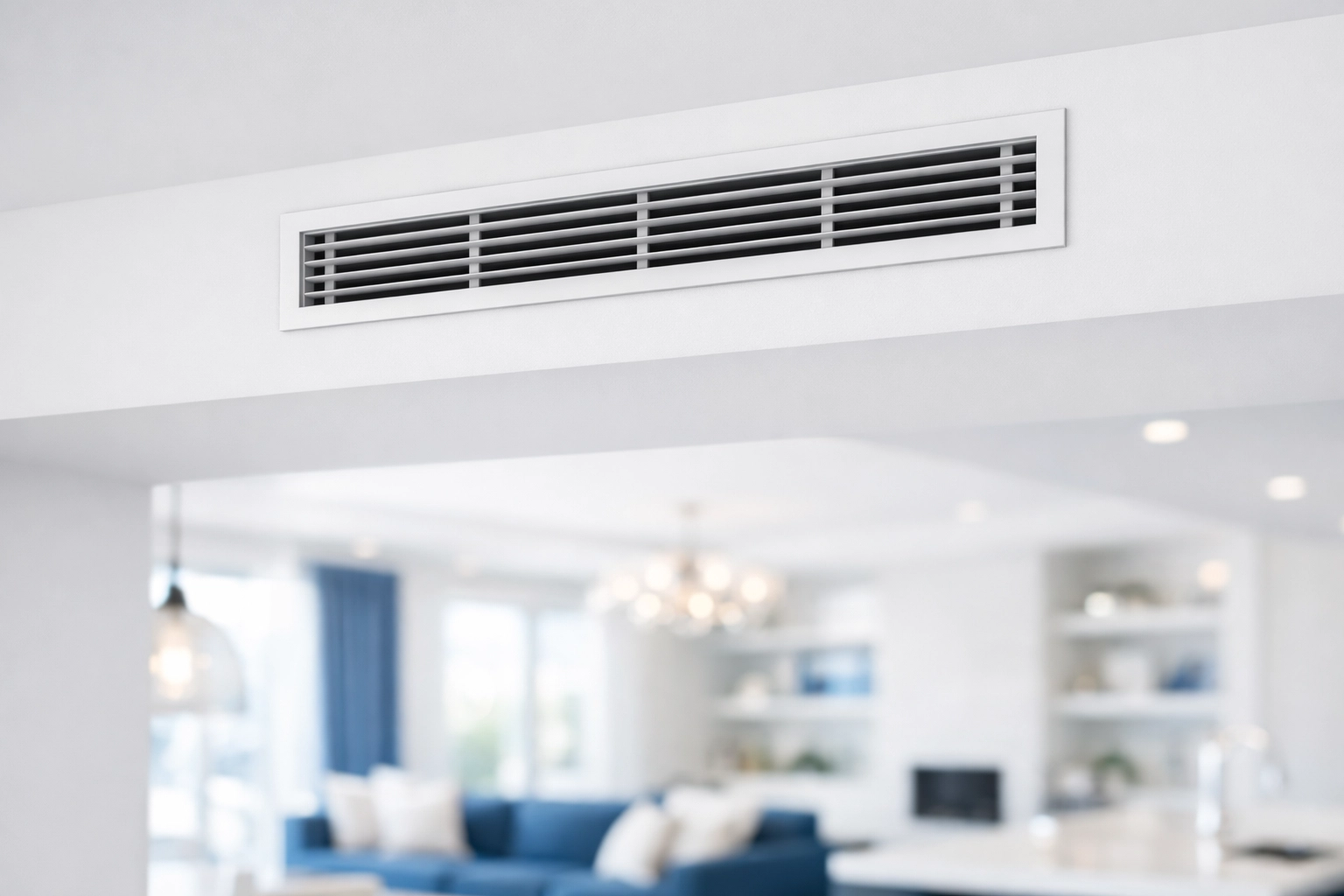 A dust-free air vent on a white wall following a professional deep cleaning service.