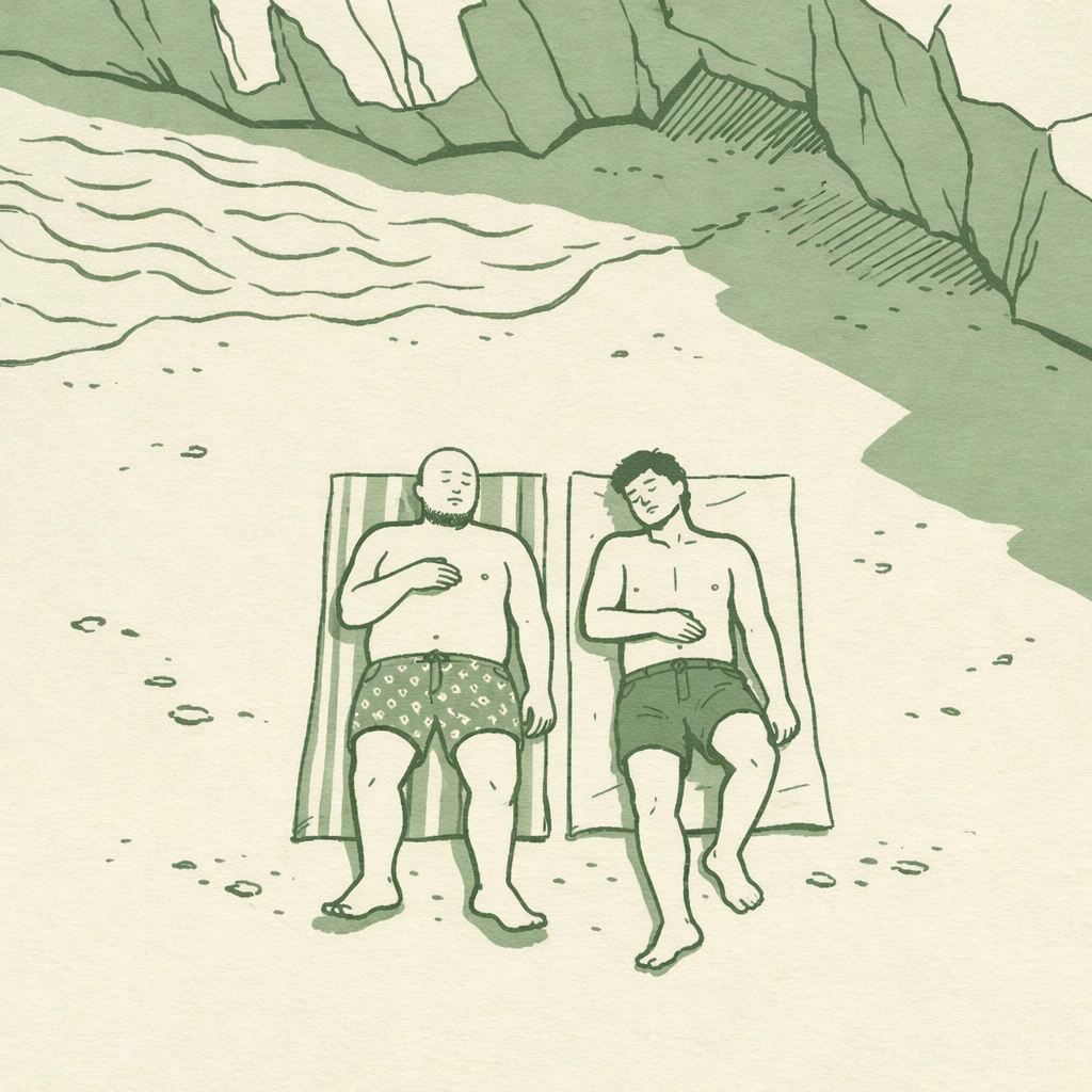 Two men sunbathing at Sydney's clothing-optional Lady Bay Beach under clifftop shadows