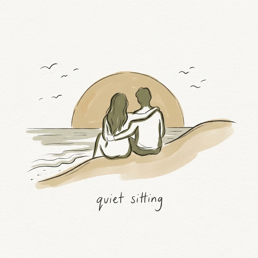 Two men sitting close together on a quiet beach at sunset, illustrating MM romance and body freedom themes in LGBTQ+ fiction.