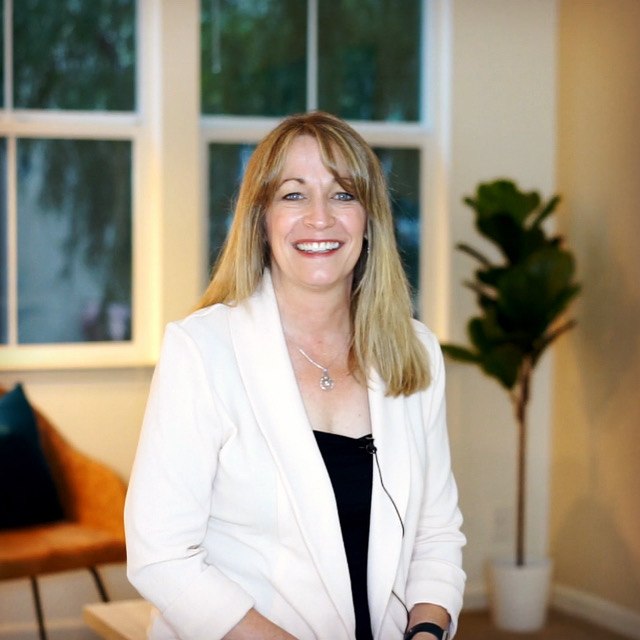 Professional Real Estate Agent in Modern Living Room