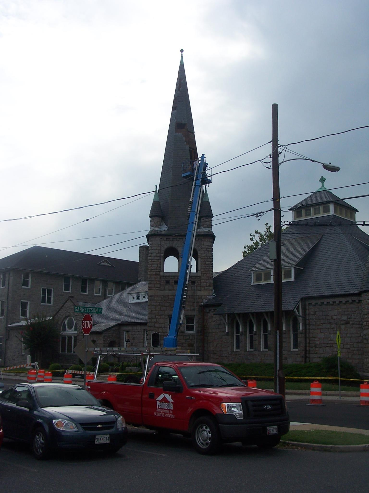 Peninsula Roofing Company crew steeple roof repairs