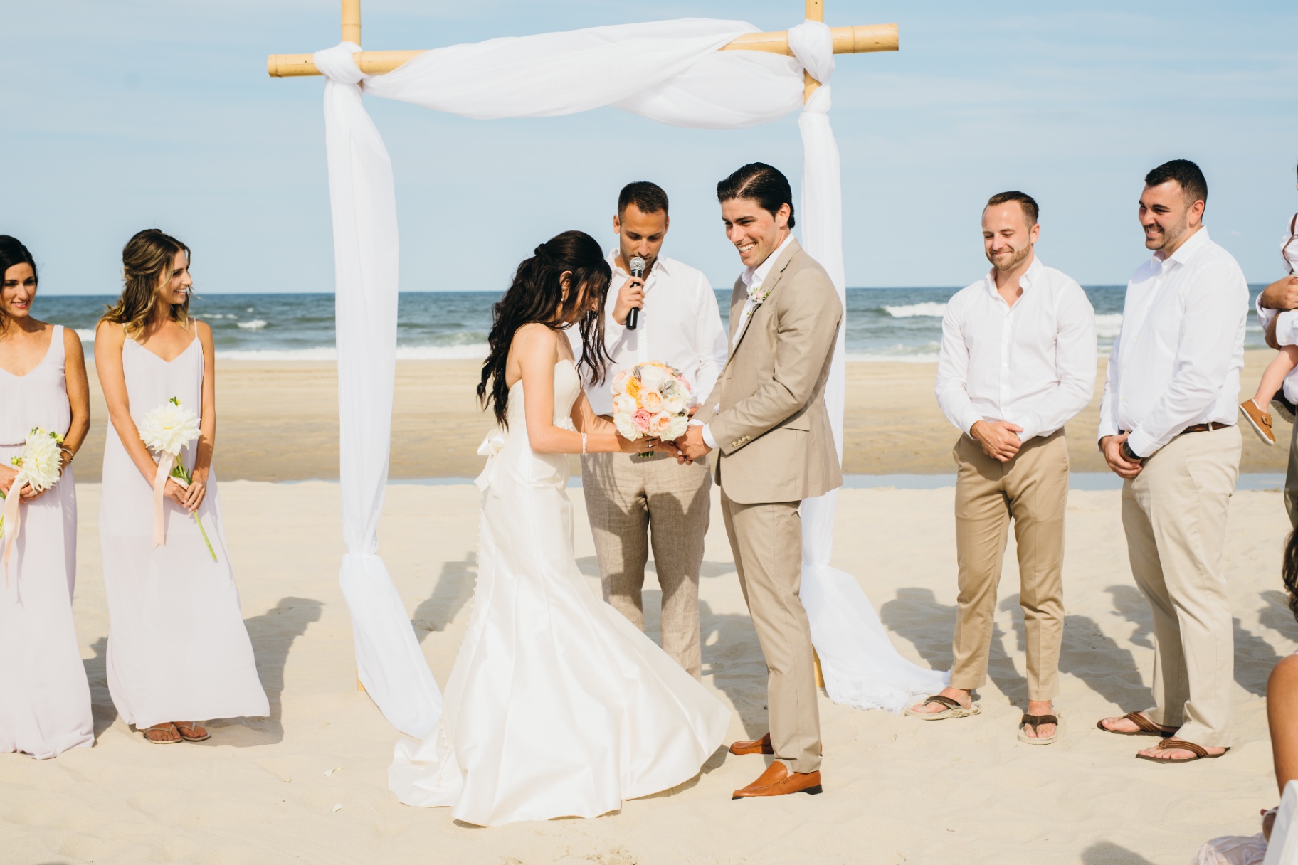 Beach Wedding Ceremony A wedding ceremony is taking place