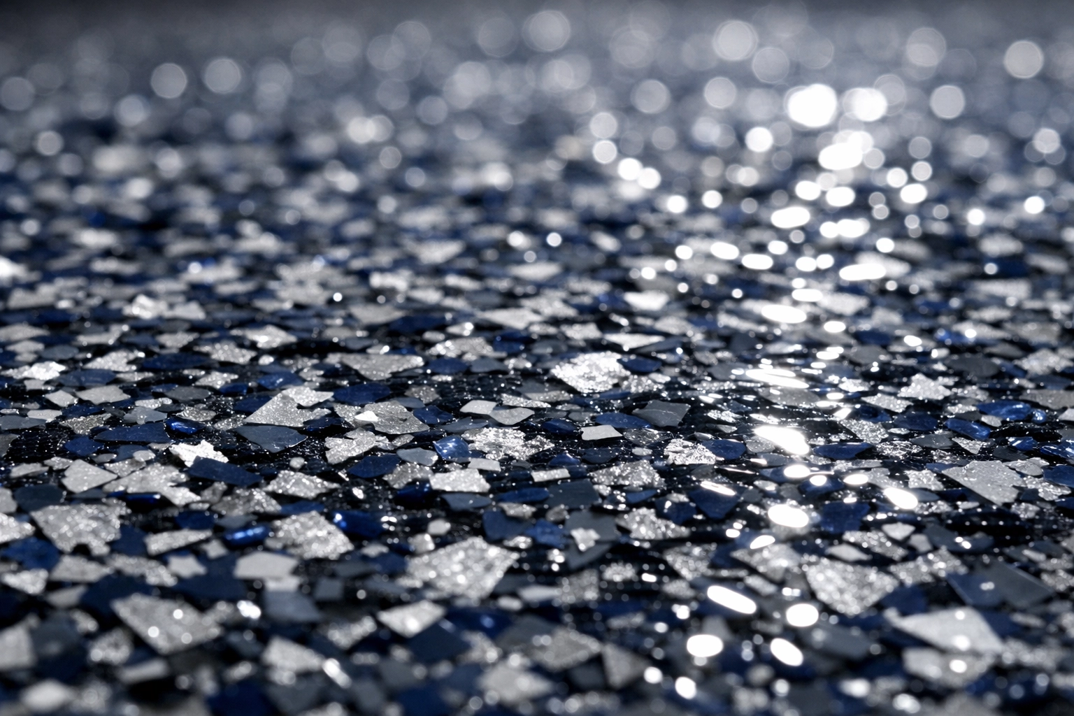 Close-up of polymer flake epoxy floor coating texture for a durable, easy-clean garage makeover