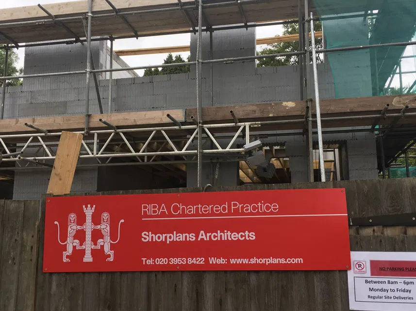 Active construction site with structural blockwork and scaffolding, highlighting Shorplans’ leadership on-site