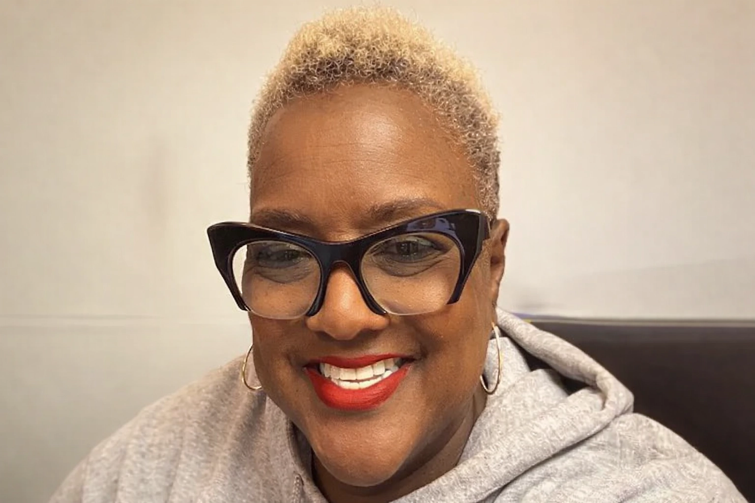 Gayle in the studio (gray hoodie)